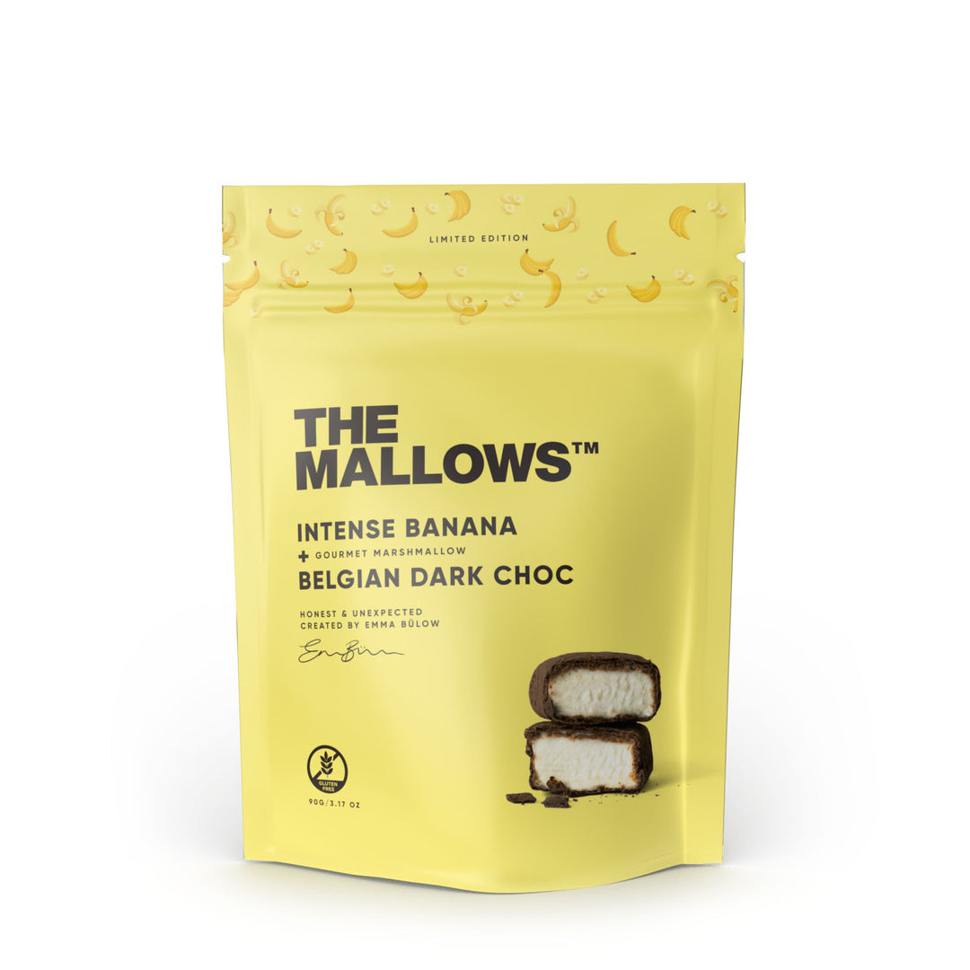 Yellow packaging of 'The Mallows' Intense Banana Belgian Dark Choc marshmallows on a white background