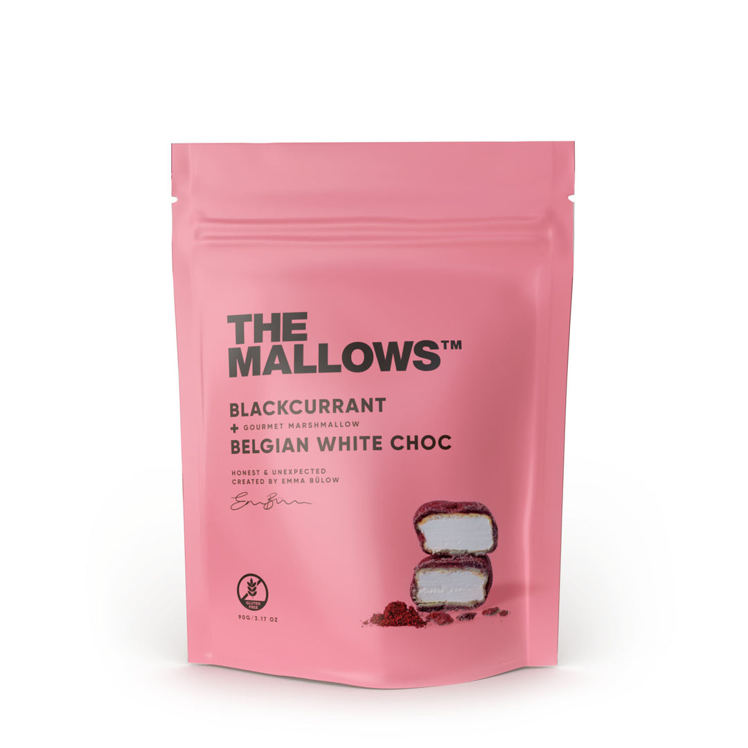 Pink package of 'The Mallows' blackcurrant and Belgian white chocolate marshmallows on a white background