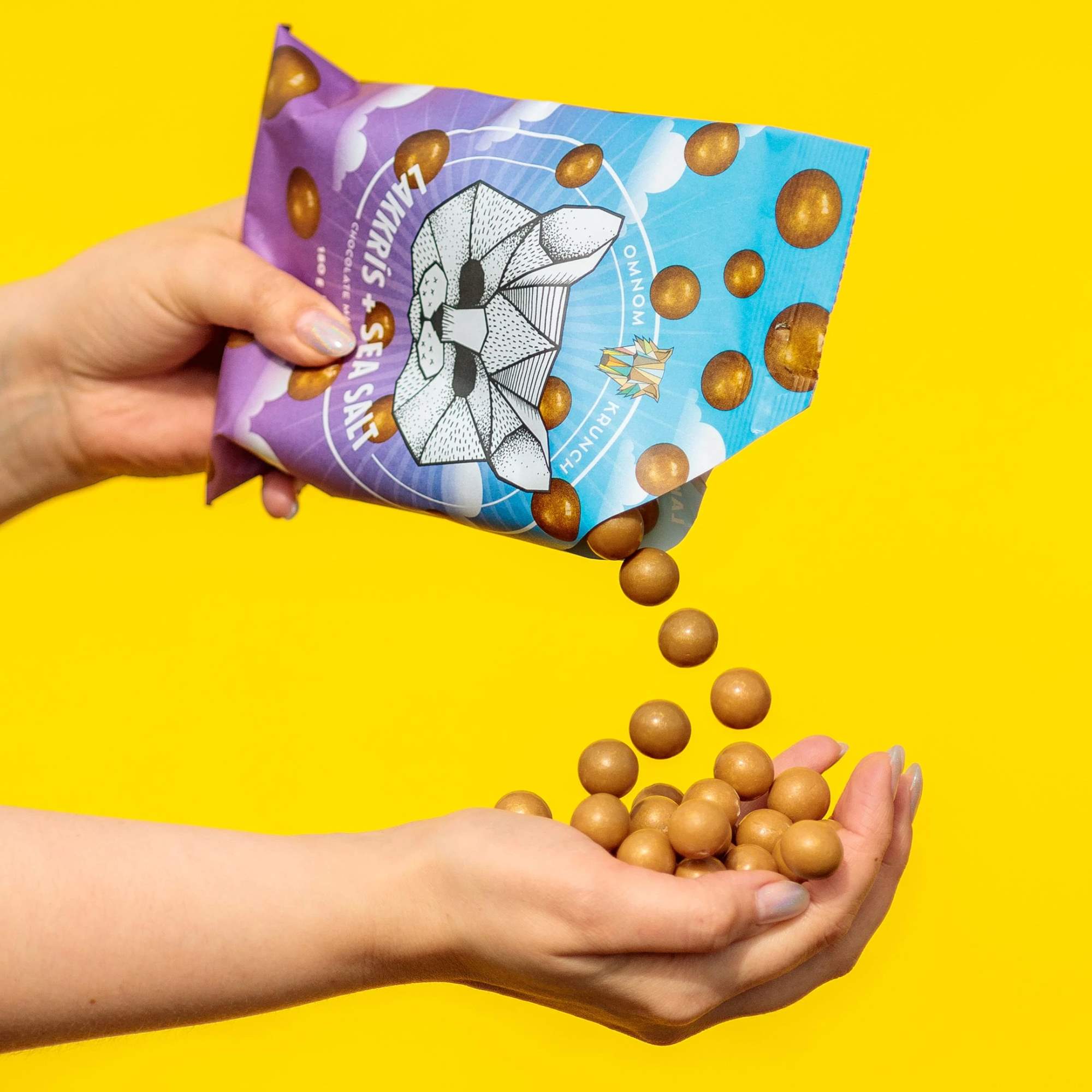 Omnom Krunch - Crunchy Malt Balls Coated In Liquorice Flavoured Chocol